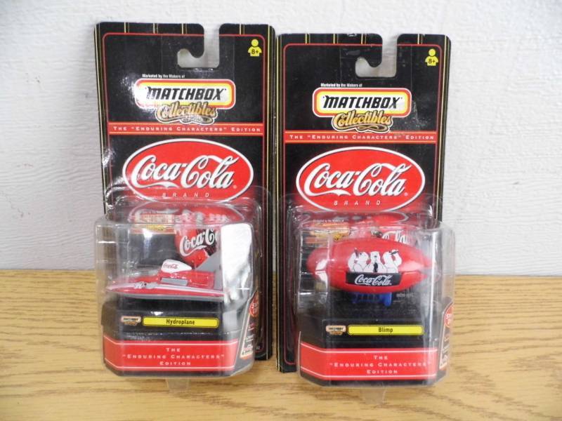 2 Coke Matchbox Cars