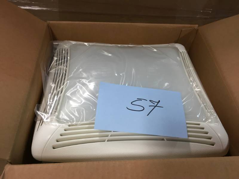 lot 57 image: NuTone 70 CFM Ceiling Bathroom Exhaust Fan with Light, White Grille and Light- good condition