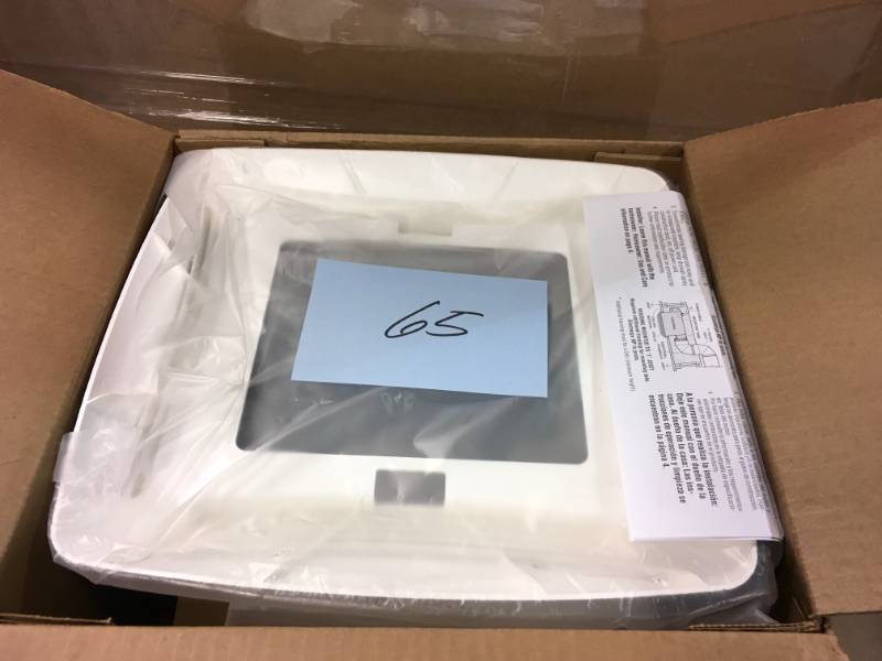 lot 65 image: NuTone 50 CFM Ceiling Bathroom Exhaust Fan with Light- not used