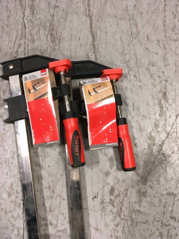 lot 97 image: BESSEY 36 in. Clutch Style Bar Clamp with Composite Plastic Handle and 3-12 in. Throat Depth- good condition