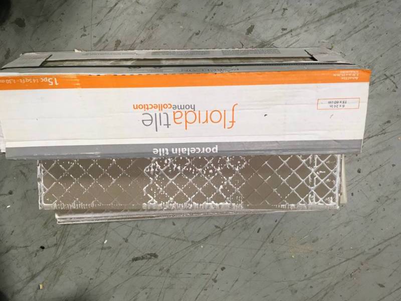 lot 127 image: Florida Tile Home Collection Wind River Grey 6 in. x 24 in. Porcelain Floor and Wall Tile (14 sq. ft.  case)- not used