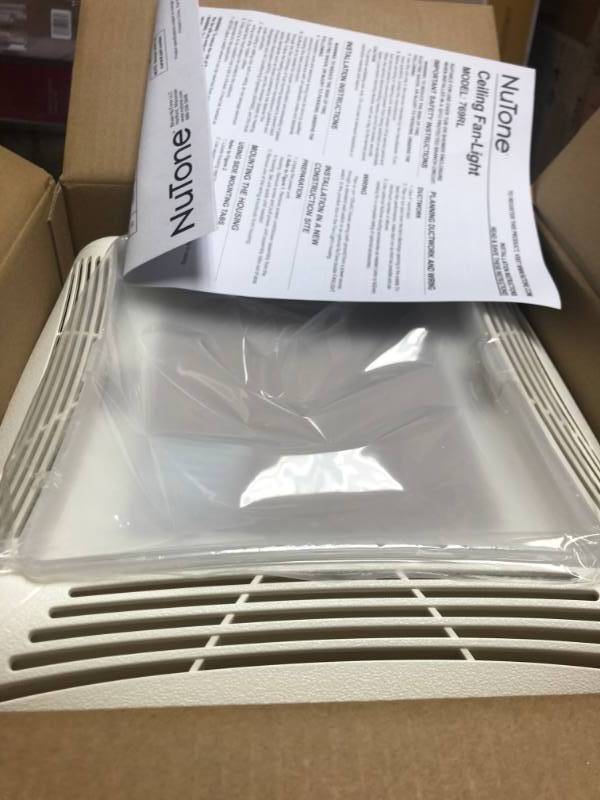 lot 45 image: NuTone 70 CFM Ceiling Bathroom Exhaust Fan with Light, White Grille and Light