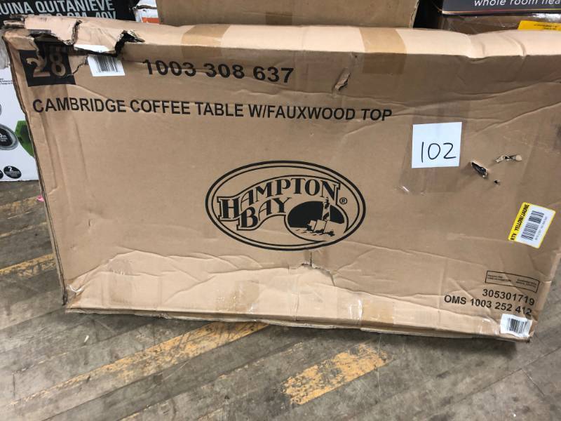 lot 102 image: Hampton Bay Cambridge Brown Rectangular Wicker Outdoor Coffee Table with Faux Wood Table Top
