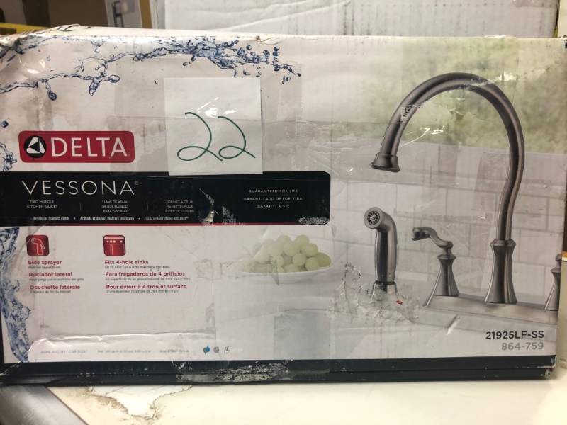 lot 22 image: Delta Vessona 2-Handle Standard Kitchen Faucet with Side Sprayer in Stainless