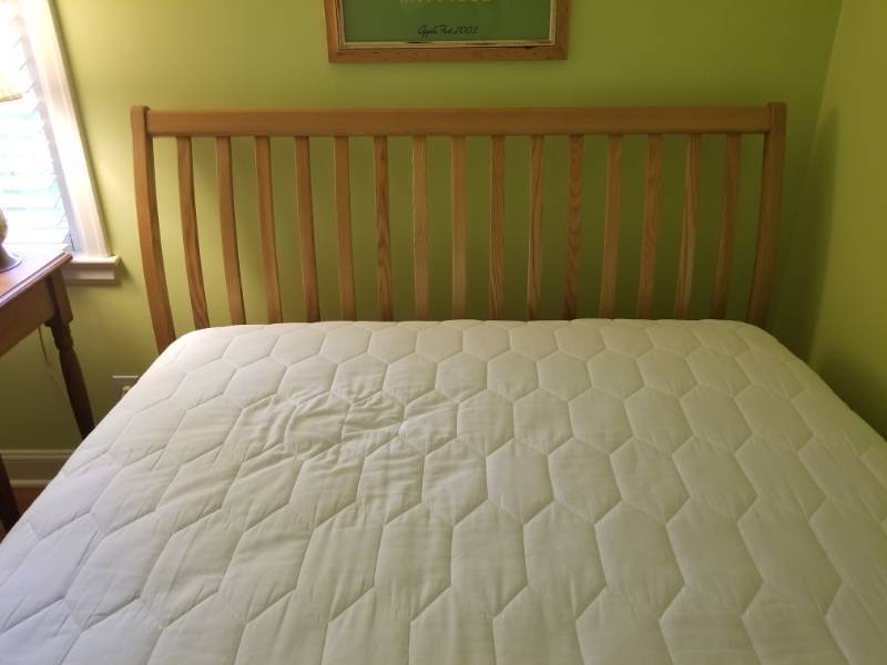 lot 24 image: Simply Stylish Queen Bedframe