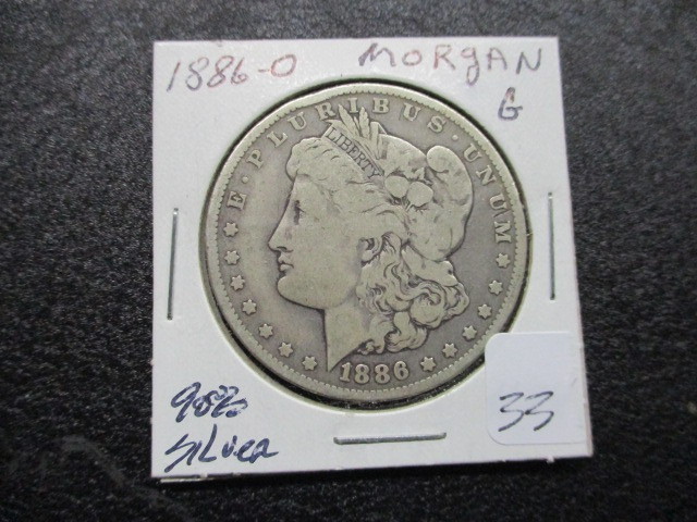 lot 33 image: 1886-O Morgan Silver Dollar