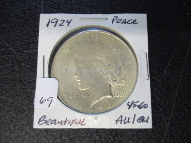 lot 69 image: 1924 AUBU Peace Silver Dollar