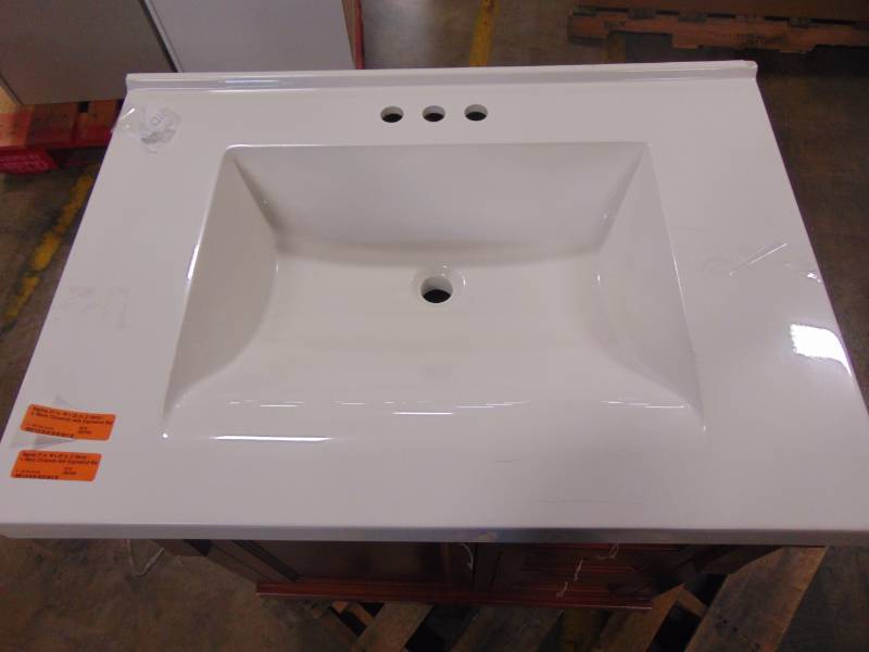 lot 28 image: Home Decorators Collection Naples 31 in. W x 22 in. D Vanity in Warm Cinnamon with Engineered Marble Vanity Top in Winter White with White Sink NACA3021D-WWH