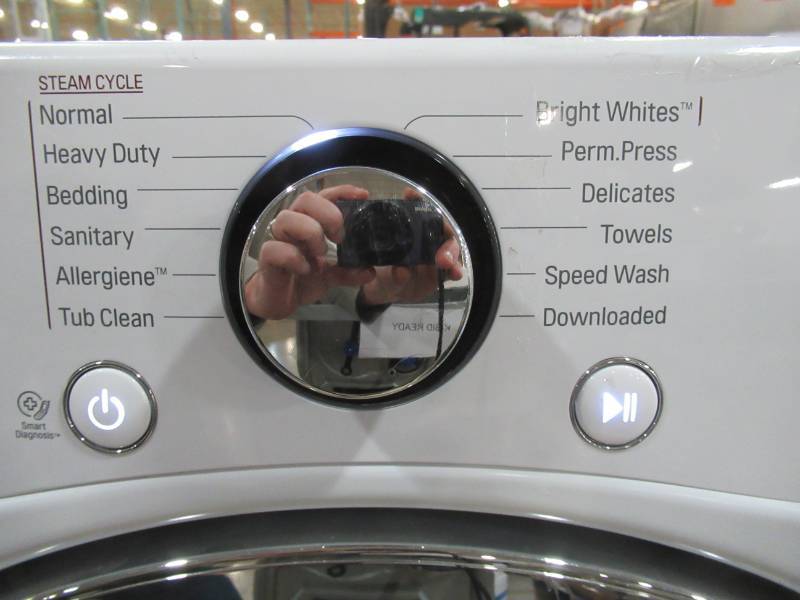 lot 205 image: Slightly Used LG 4.5 cu.ft. Ultra Large Capacity White Front Load Washer with Steam and Wi-Fi Connectivity - Electronics work and Drum Spins