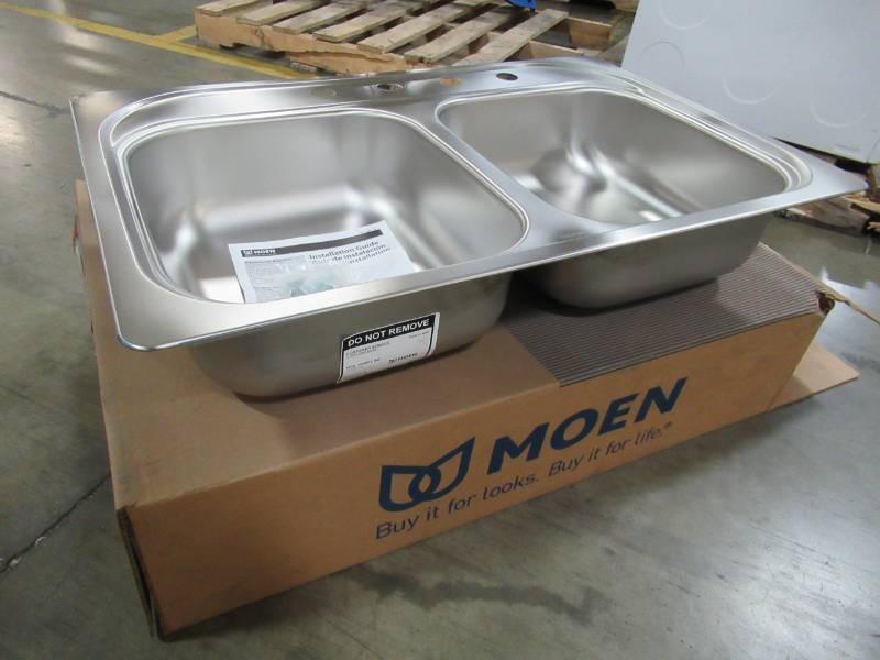lot 219 image: MOEN 2200TM SERIES Drop-In Double  33 X 22 X 6 12 Stainless Steel Sink 22 Gauge, 4 Holes, G222174