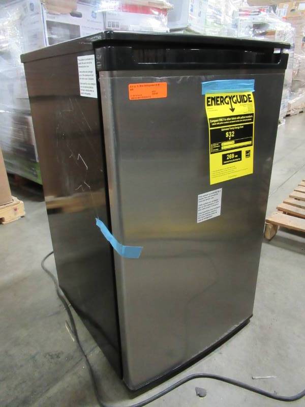 lot 317 image: Magic Chef 4.4 cu. ft. Mini Refrigerator in Black and Stainless, HMBR440BE. - Scratched LH Side Panel. - NEW
