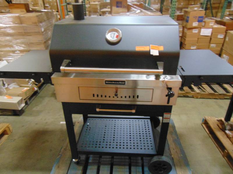 lot 99 image: KitchenAid Cart-Style Charcoal Grill in Black with Foldable Side Shelves 810-0021