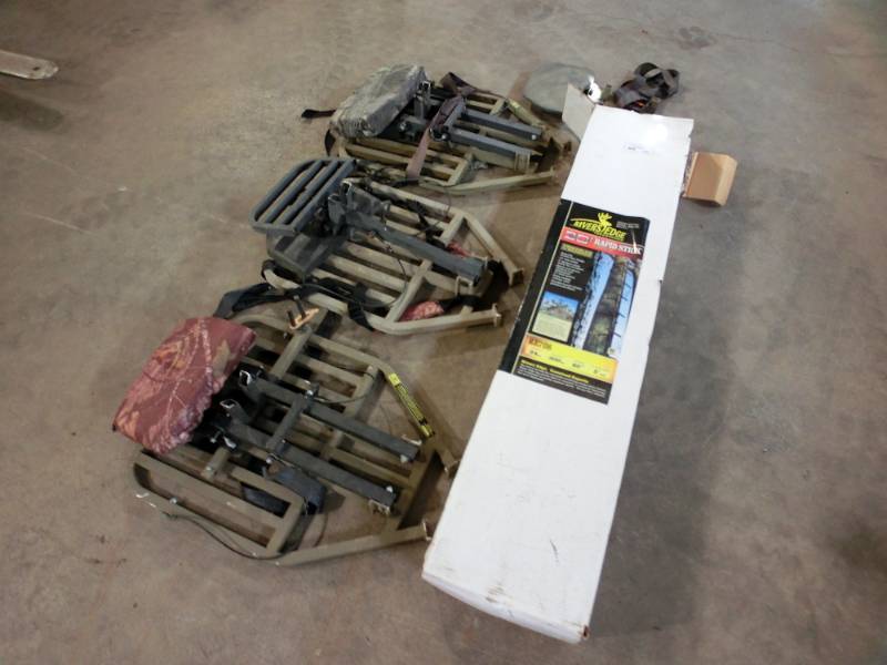 lot 315 image: Pallet of deer stands and climber