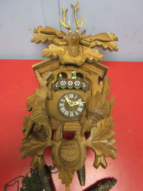 lot 703 image: HUNTERS-STYLE GERMAN CUCKOO CLOCK