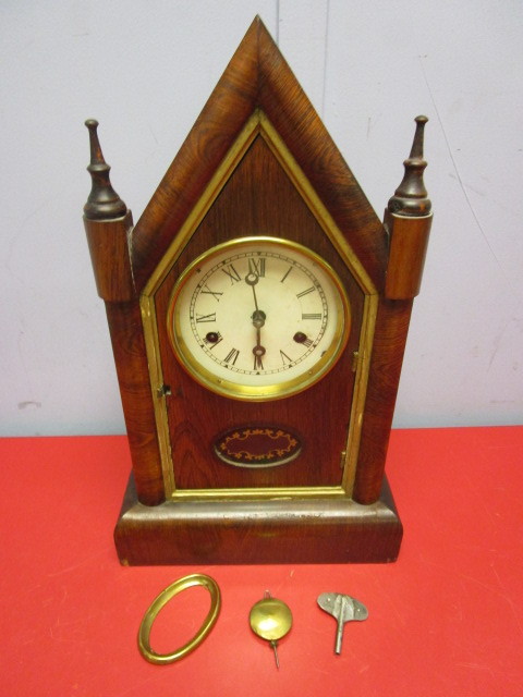 lot 706 image: SOLID WOOD GOTHIC MANTEL CLOCK