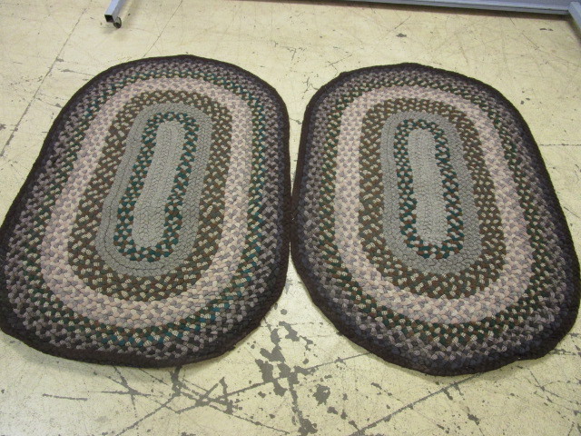 lot 735 image: DECORATIVE HAND-BRAIDED RUGS