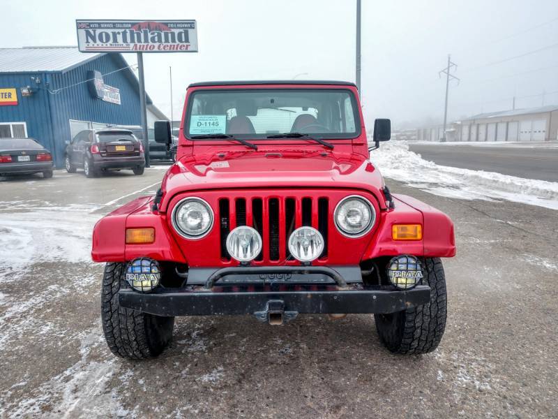 lot 1 image: 1997 Jeep Wrangler Sport Utility 2D  Hard, Soft, & Bikini Tops