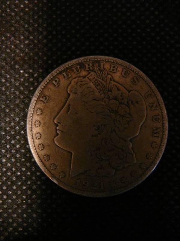 lot 107 image: 1921 S Morgan Silver Dollar