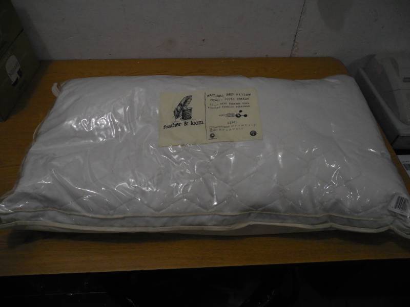 lot 87 image: Feather and Loom Quilted Pillow