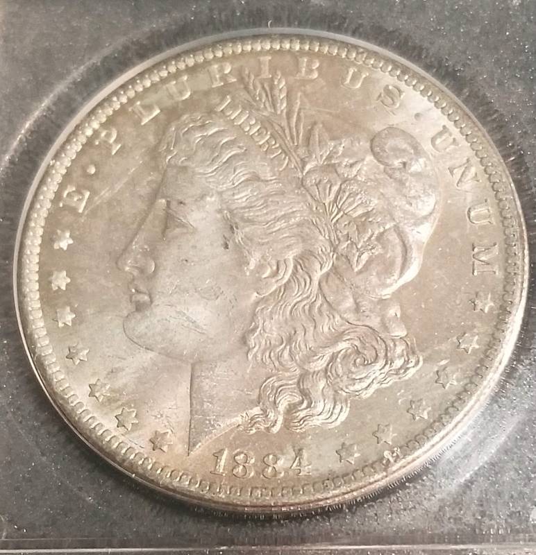 1884-O MORGAN SILVER DOLLAR MS64 OLD ACCUGRADE HOLDER