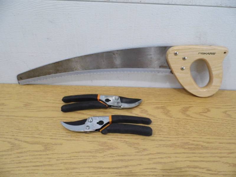 lot 9 image: Fiskars Tree Saw - 2 Pair Fiskars Cutters