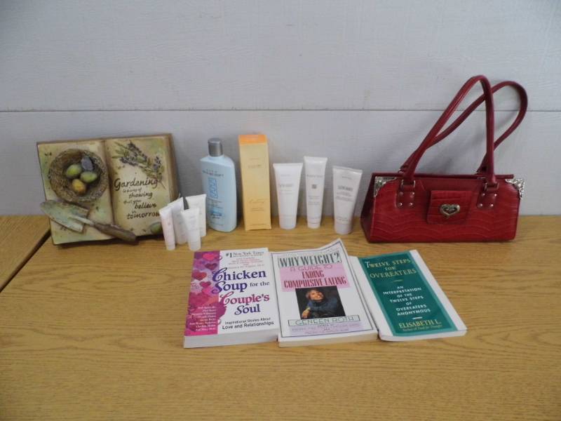 lot 35 image: Lotion - Purse - Book