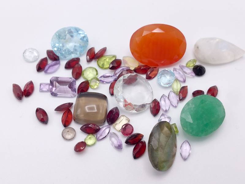 61.00 CT of Loose Stones Emerald, Garnet,  Amethyst, Topaz, and More