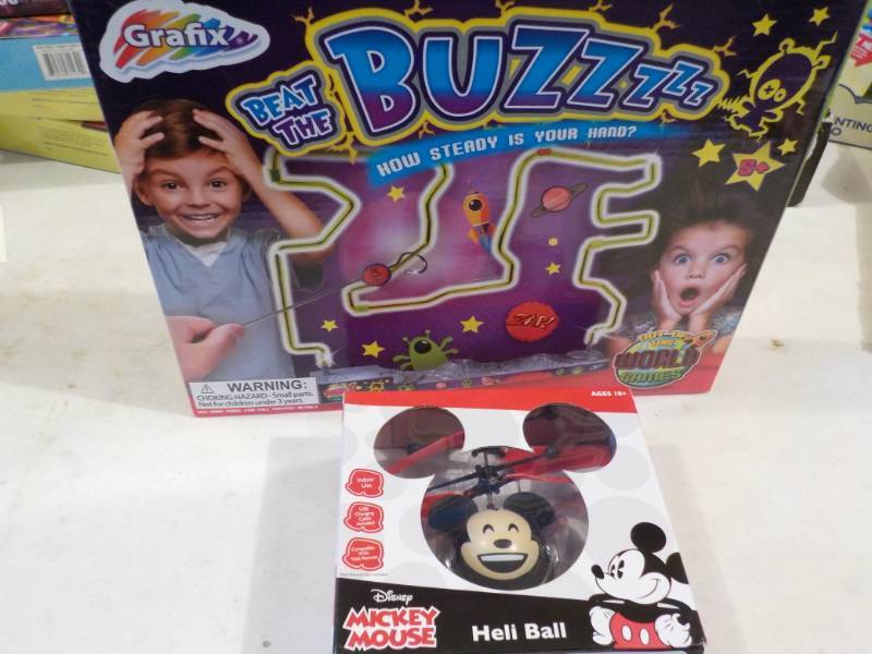 lot 17 image: Beat the Buzz and Mickey Mouse Heli...