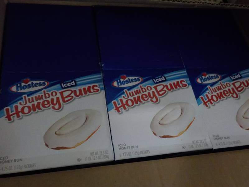 lot 129 image: case of Hostess Jumbo Honey Buns...