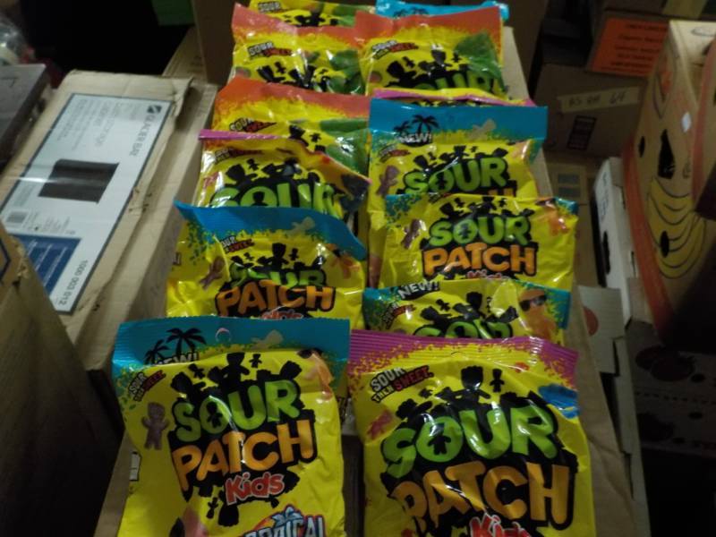 lot 137 image: 13 Bags Sour Patch Kids Candy...