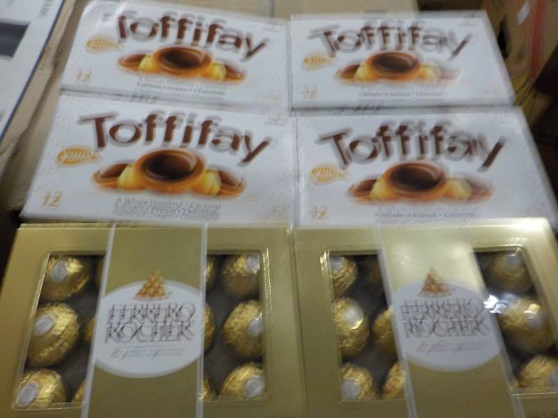 lot 142 image: Toffifay and Ferrero Rocher...