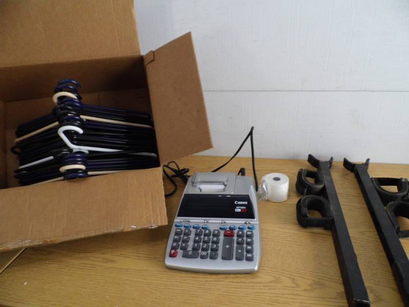 lot 24 image: Hangers - Calculator - Gun Rack