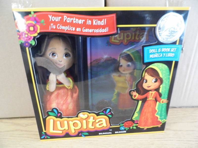 lot 58 image: Lot of 8 Lupita Bilingual Dolls