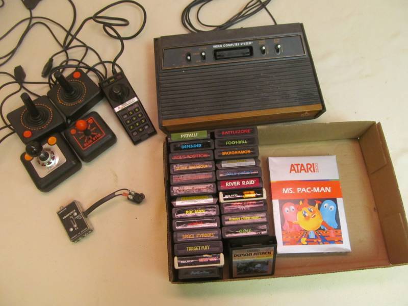 lot 41 image: Vintage Atari system,games,controllers