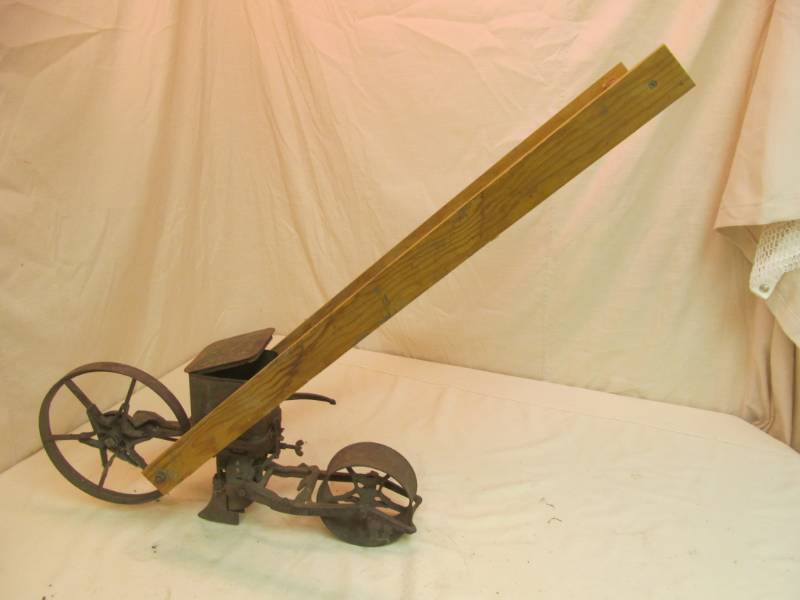 lot 82 image: antique seed  planter