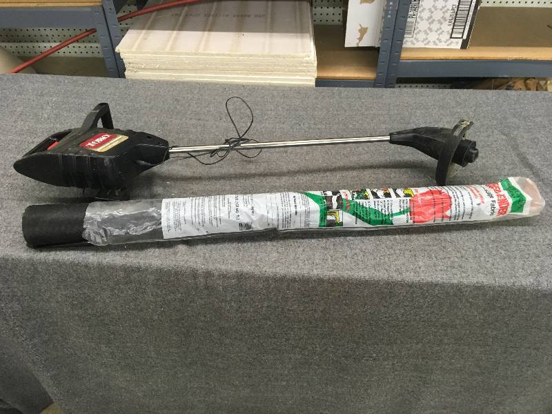 lot 26 image: Toro Weed Trimmer & Weed Ender Landscape Fabric 36 X 50 Ft.