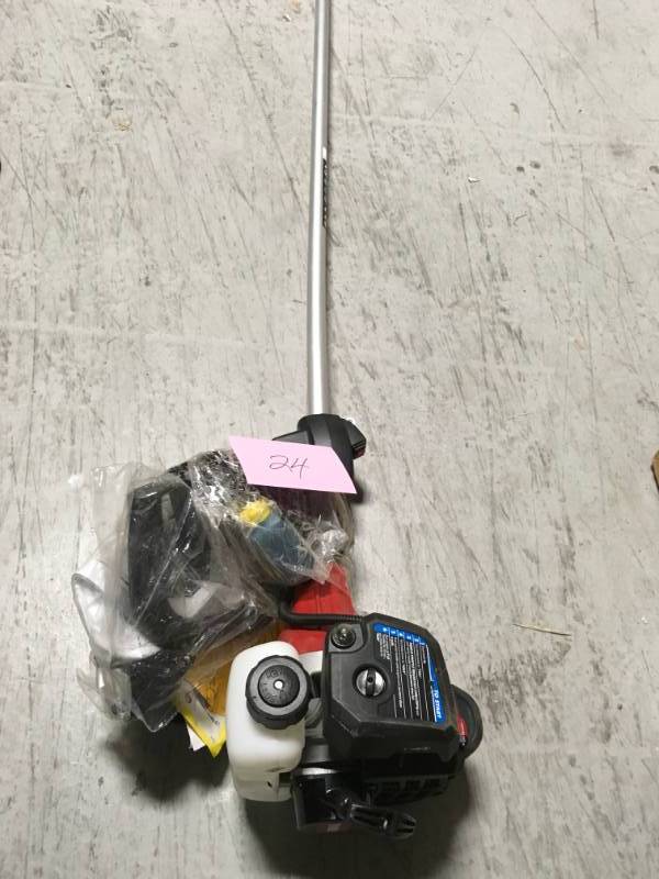 lot 24 image: Toro 2-Cycle 25.4cc Attachment Capable Straight Shaft Gas String Trimmer  USED