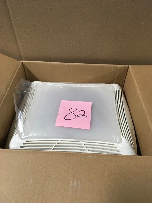 lot 82 image: NuTone 70 CFM Ceiling Bathroom Exhaust Fan with Light, White Grille and Light- good condition