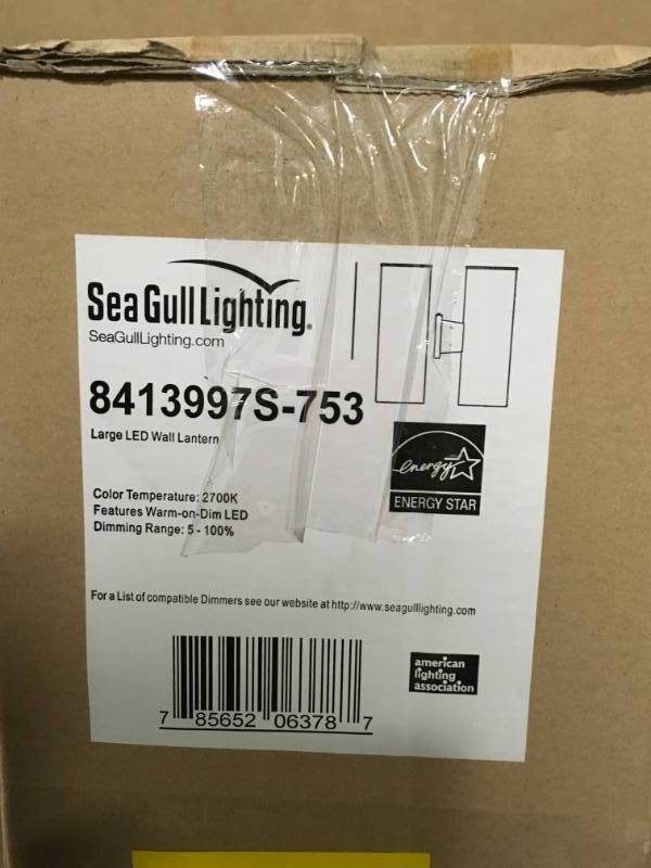 lot 117 image: Sea Gull Lighting Outdoor Cylinders Painted Brushed Nickel Outdoor Integrated LED Wall Lantern Sconce