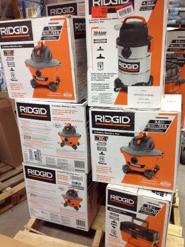 lot 156 image: Pallet of assorted Ridgid Vacuums different sizes some may need repair or have missing pieces