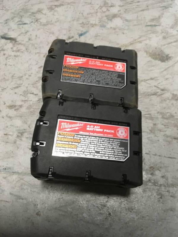 lot 29 image: Milwaukee M18 18-Volt Lithium-Ion XC Extended Capacity Battery Pack 5.0Ah 2- good condition