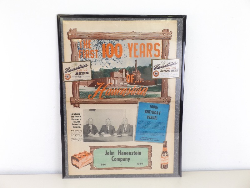 lot 24 image: Framed 1964 Hauenstein Beer Newspaper Ad Noting The Breweries 100 Years