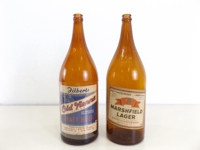 lot 145 image: 2 Vintage 12 Gallon Marshfield and Old Vienna Beer Bottles