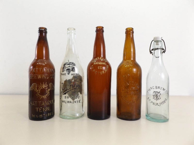 lot 146 image: Lot of 5 Vintage Embossed Beer Bottles