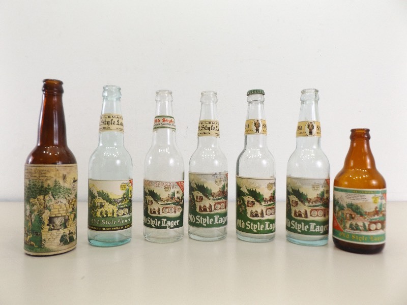 lot 147 image: Lot of 7 Antique and Vintage Heilemans Old Style Beer Bottles