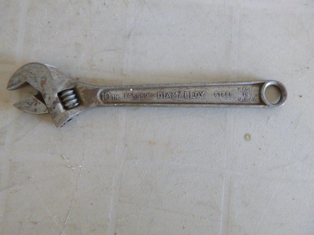 lot 21 image: Vintage Diamalloy 10 Adjustable Wrench