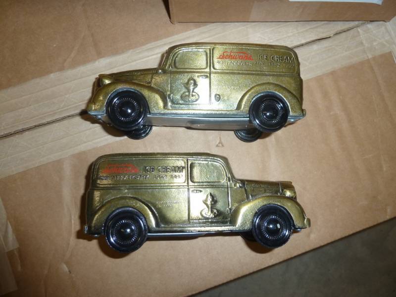 lot 12 image: Two die cast Schwanns truck banks, ...