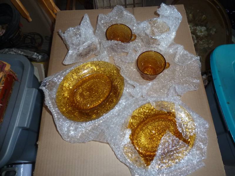 lot 67 image: Set of 4 plates and 4 cups amber di...