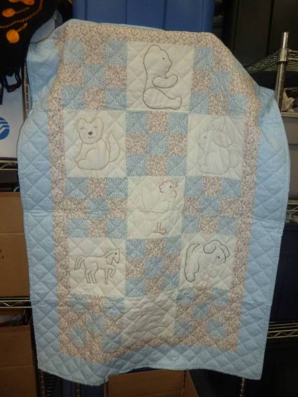 lot 83 image: Like new 34x52 baby quilt, flannel ...