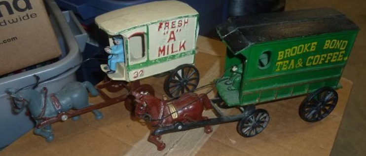 lot 95 image: 2 Cast Iron wagons with horse and d...